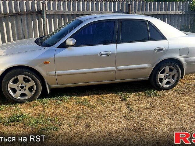 Серый Мазда 626, объемом двигателя 2 л и пробегом 350 тыс. км за 2850 $, фото 1 на Automoto.ua