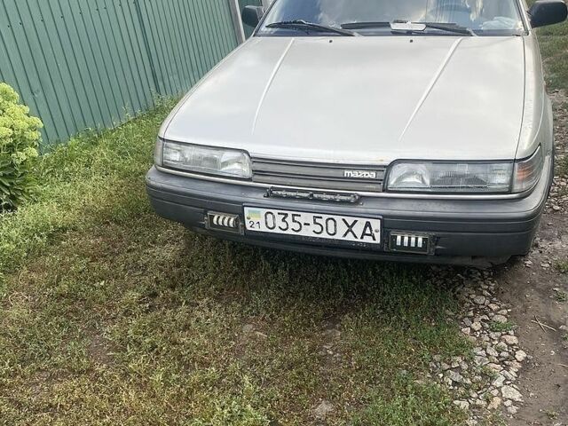 Сірий Мазда 626, об'ємом двигуна 2 л та пробігом 243 тис. км за 1099 $, фото 1 на Automoto.ua