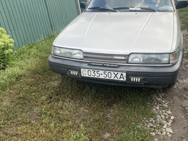 Серый Мазда 626, объемом двигателя 2 л и пробегом 243 тыс. км за 1106 $, фото 1 на Automoto.ua