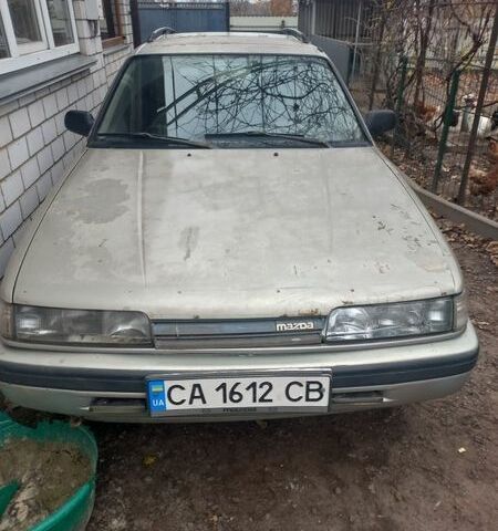 Серый Мазда 626, объемом двигателя 1.8 л и пробегом 450 тыс. км за 600 $, фото 1 на Automoto.ua