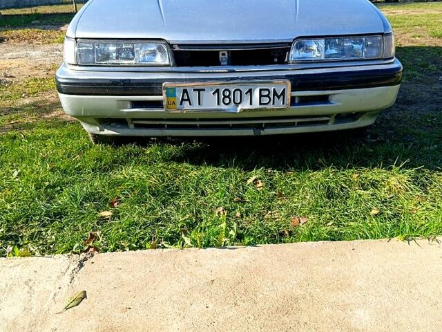 Серый Мазда 626, объемом двигателя 2 л и пробегом 318 тыс. км за 800 $, фото 1 на Automoto.ua