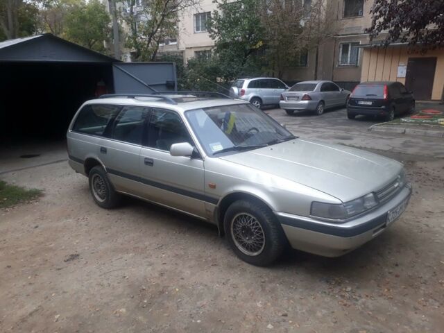 Серый Мазда 626, объемом двигателя 2 л и пробегом 782 тыс. км за 2000 $, фото 1 на Automoto.ua