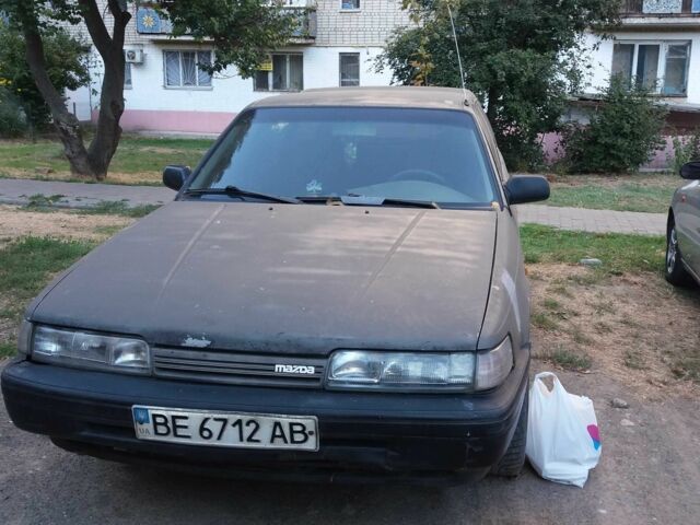 Серый Мазда 626, объемом двигателя 2 л и пробегом 400 тыс. км за 1005 $, фото 1 на Automoto.ua