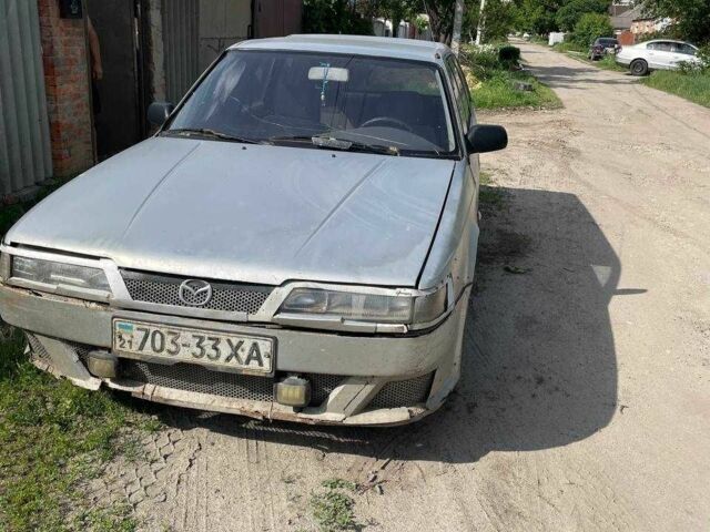 Серый Мазда 626, объемом двигателя 2 л и пробегом 356 тыс. км за 400 $, фото 1 на Automoto.ua