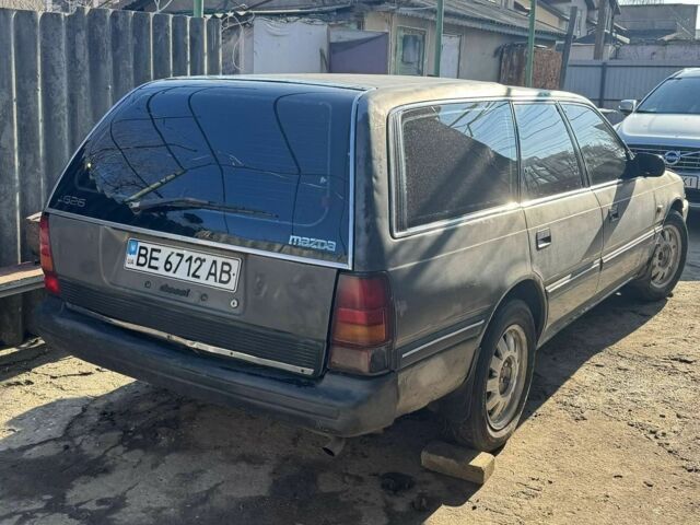 Сірий Мазда 626, об'ємом двигуна 2 л та пробігом 440 тис. км за 959 $, фото 1 на Automoto.ua