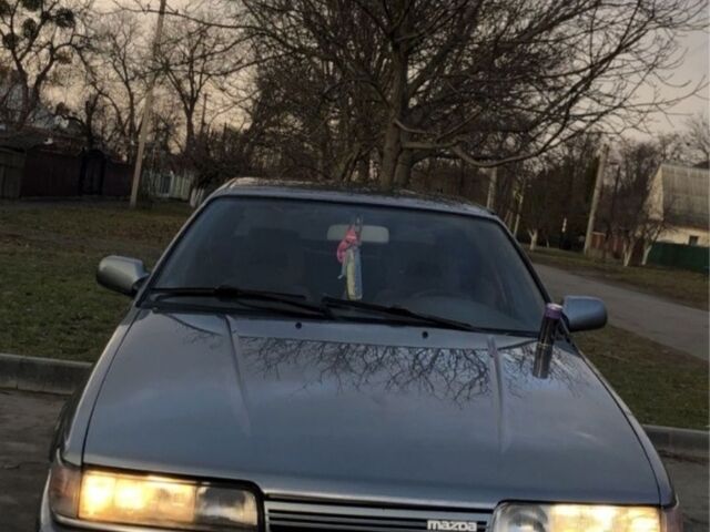 Сірий Мазда 626, об'ємом двигуна 2 л та пробігом 300 тис. км за 1003 $, фото 1 на Automoto.ua