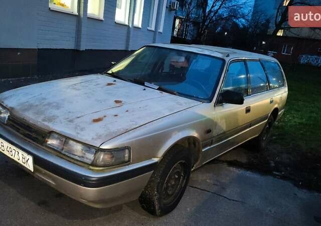 Сірий Мазда 626, об'ємом двигуна 2 л та пробігом 200 тис. км за 900 $, фото 1 на Automoto.ua