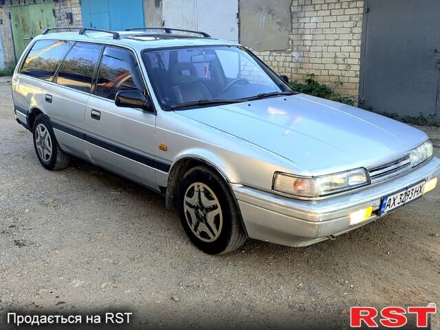 Серый Мазда 626, объемом двигателя 2 л и пробегом 290 тыс. км за 999 $, фото 1 на Automoto.ua