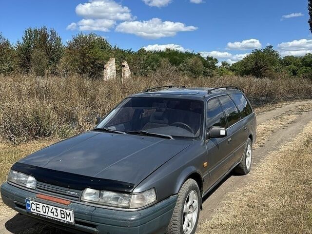 Сірий Мазда 626, об'ємом двигуна 2 л та пробігом 373 тис. км за 851 $, фото 1 на Automoto.ua