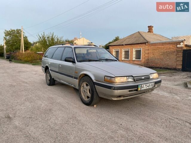 Серый Мазда 626, объемом двигателя 2 л и пробегом 235 тыс. км за 999 $, фото 1 на Automoto.ua