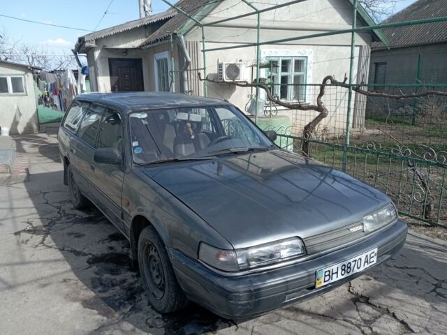 Серый Мазда 626, объемом двигателя 2.2 л и пробегом 389 тыс. км за 1700 $, фото 1 на Automoto.ua