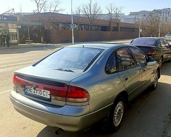 Серый Мазда 626, объемом двигателя 1.8 л и пробегом 256 тыс. км за 2200 $, фото 1 на Automoto.ua