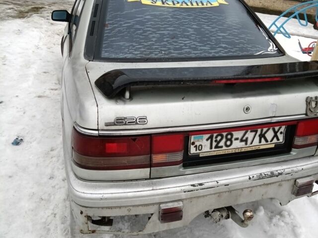 Сірий Мазда 626, об'ємом двигуна 2.2 л та пробігом 300 тис. км за 1393 $, фото 1 на Automoto.ua