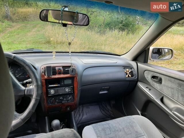 Серый Мазда 626, объемом двигателя 2 л и пробегом 420 тыс. км за 2000 $, фото 1 на Automoto.ua