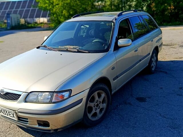 Серый Мазда 626, объемом двигателя 2 л и пробегом 250 тыс. км за 3200 $, фото 1 на Automoto.ua