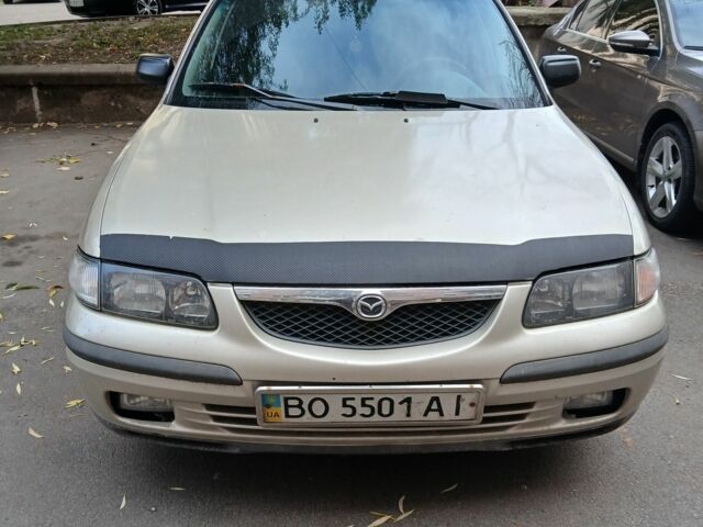 Серый Мазда 626, объемом двигателя 2 л и пробегом 300 тыс. км за 1390 $, фото 1 на Automoto.ua