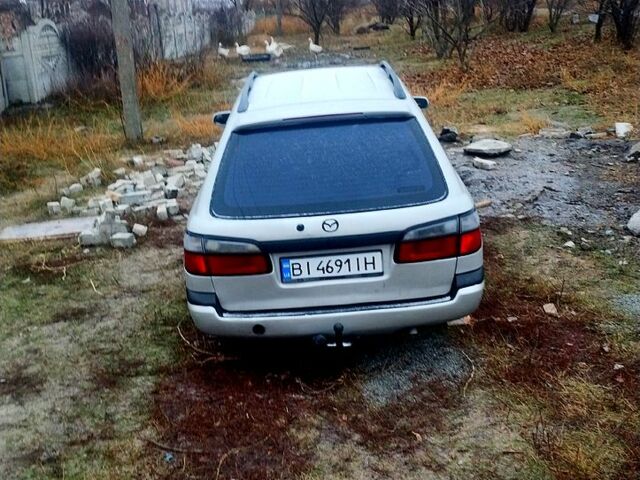 Серый Мазда 626, объемом двигателя 1.8 л и пробегом 400 тыс. км за 2500 $, фото 1 на Automoto.ua
