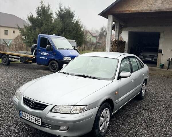 Серый Мазда 626, объемом двигателя 2 л и пробегом 220 тыс. км за 1700 $, фото 1 на Automoto.ua