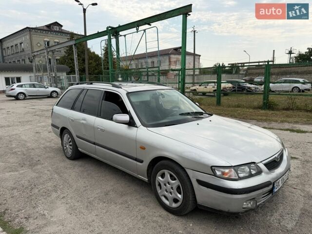 Серый Мазда 626, объемом двигателя 2 л и пробегом 352 тыс. км за 1250 $, фото 1 на Automoto.ua