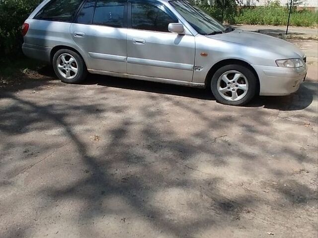 Серый Мазда 626, объемом двигателя 2 л и пробегом 500 тыс. км за 1900 $, фото 1 на Automoto.ua