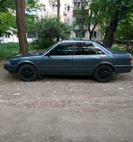 Сірий Мазда 626, об'ємом двигуна 2 л та пробігом 300 тис. км за 1700 $, фото 1 на Automoto.ua