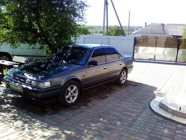 Сірий Мазда 626, об'ємом двигуна 2 л та пробігом 220 тис. км за 1500 $, фото 1 на Automoto.ua