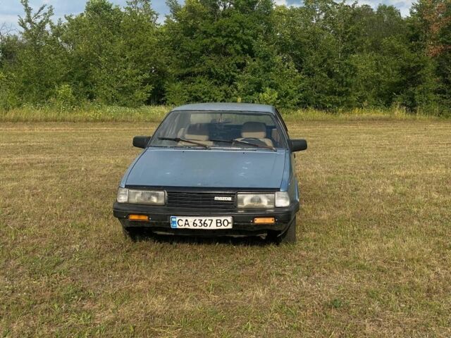 Синій Мазда 626, об'ємом двигуна 2 л та пробігом 512 тис. км за 700 $, фото 1 на Automoto.ua