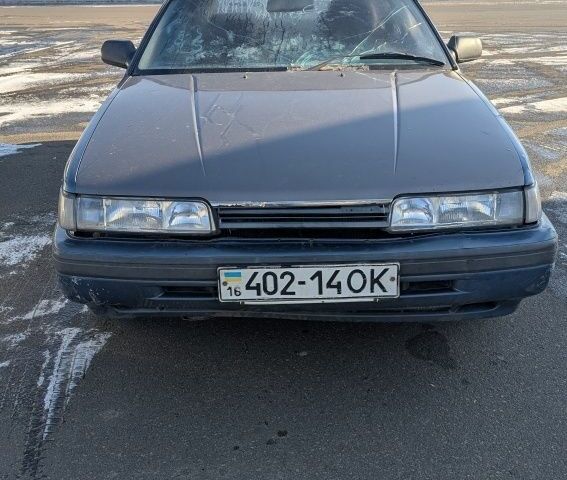 Синій Мазда 626, об'ємом двигуна 2 л та пробігом 300 тис. км за 1000 $, фото 1 на Automoto.ua