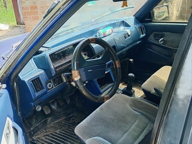 Синий Мазда 626, объемом двигателя 2 л и пробегом 240 тыс. км за 450 $, фото 1 на Automoto.ua
