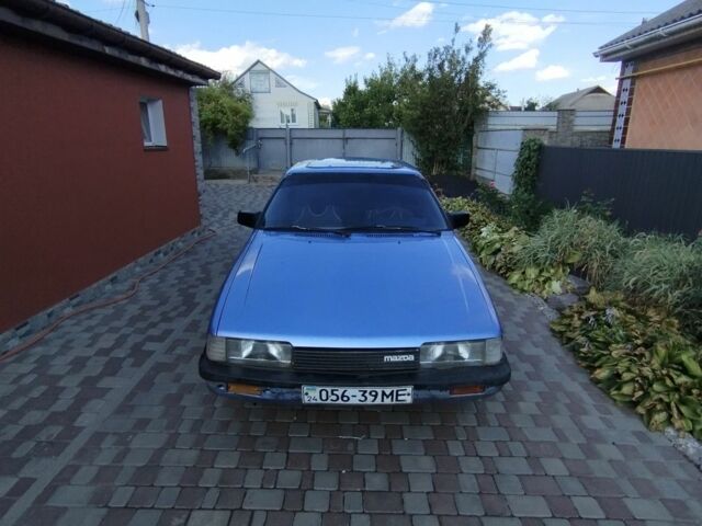Синий Мазда 626, объемом двигателя 0 л и пробегом 450 тыс. км за 650 $, фото 1 на Automoto.ua