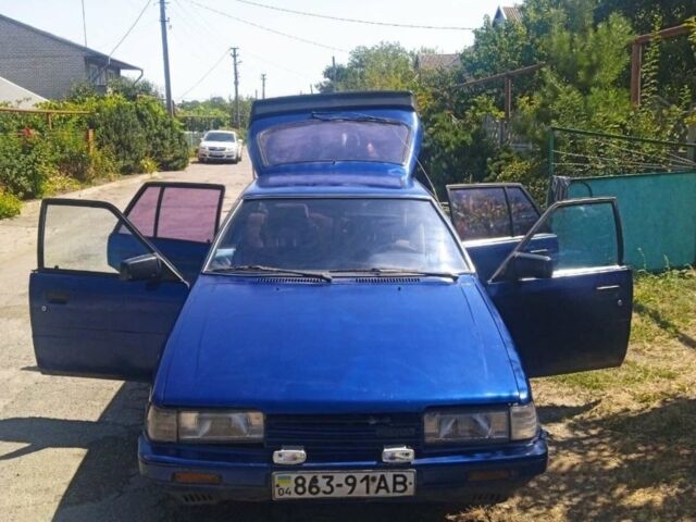 Синий Мазда 626, объемом двигателя 1.8 л и пробегом 354 тыс. км за 1000 $, фото 1 на Automoto.ua