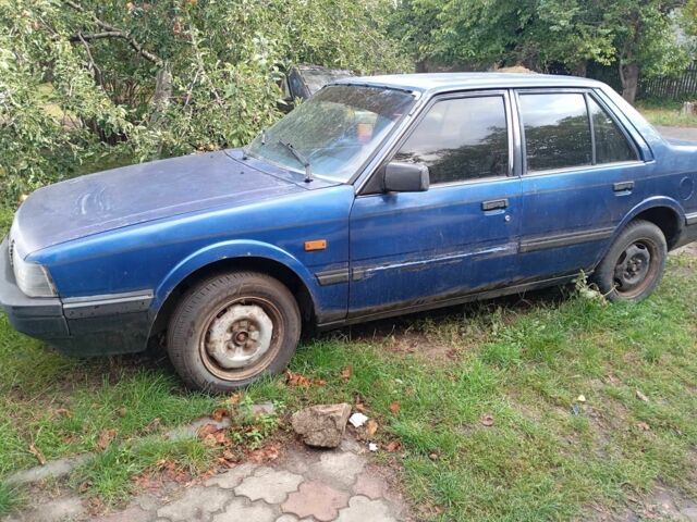 Синій Мазда 626, об'ємом двигуна 2 л та пробігом 200 тис. км за 700 $, фото 1 на Automoto.ua