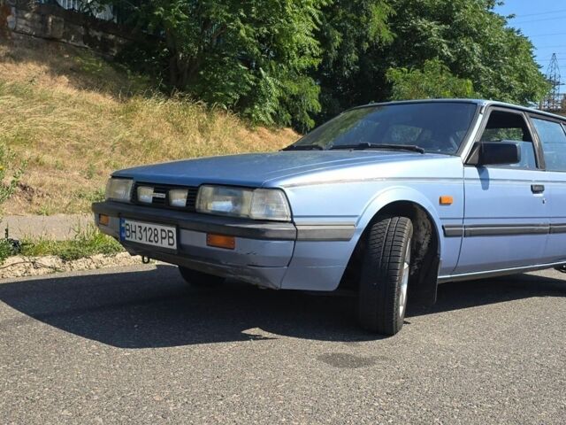 Синий Мазда 626, объемом двигателя 2 л и пробегом 302 тыс. км за 1600 $, фото 1 на Automoto.ua