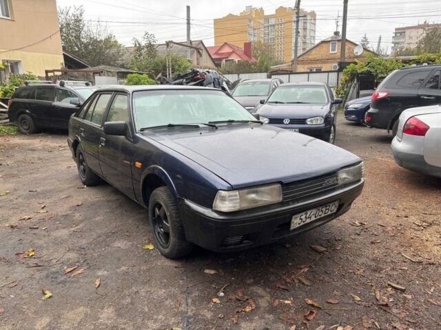 Синий Мазда 626, объемом двигателя 2 л и пробегом 508 тыс. км за 666 $, фото 1 на Automoto.ua