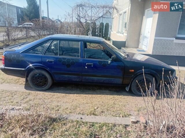 Синій Мазда 626, об'ємом двигуна 2 л та пробігом 380 тис. км за 800 $, фото 1 на Automoto.ua