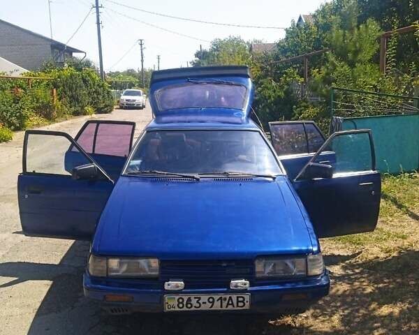 Синій Мазда 626, об'ємом двигуна 1.8 л та пробігом 354 тис. км за 1000 $, фото 1 на Automoto.ua