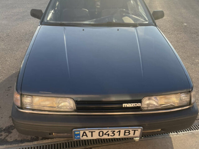 Синий Мазда 626, объемом двигателя 2 л и пробегом 395 тыс. км за 1000 $, фото 1 на Automoto.ua
