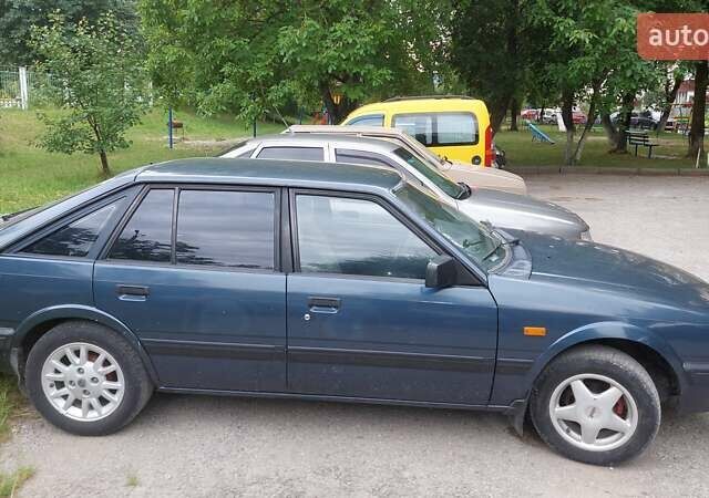 Синій Мазда 626, об'ємом двигуна 1.59 л та пробігом 309 тис. км за 1200 $, фото 1 на Automoto.ua