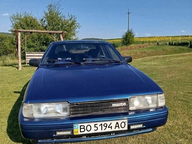 Синий Мазда 626, объемом двигателя 2 л и пробегом 600 тыс. км за 900 $, фото 1 на Automoto.ua
