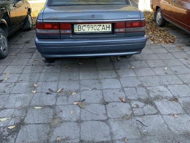 Синий Мазда 626, объемом двигателя 2 л и пробегом 250 тыс. км за 800 $, фото 1 на Automoto.ua