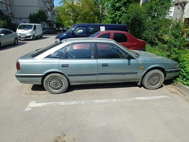 Синий Мазда 626, объемом двигателя 2 л и пробегом 250 тыс. км за 800 $, фото 1 на Automoto.ua