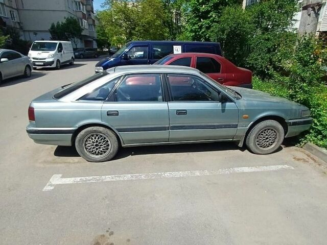 Синій Мазда 626, об'ємом двигуна 2 л та пробігом 250 тис. км за 800 $, фото 1 на Automoto.ua