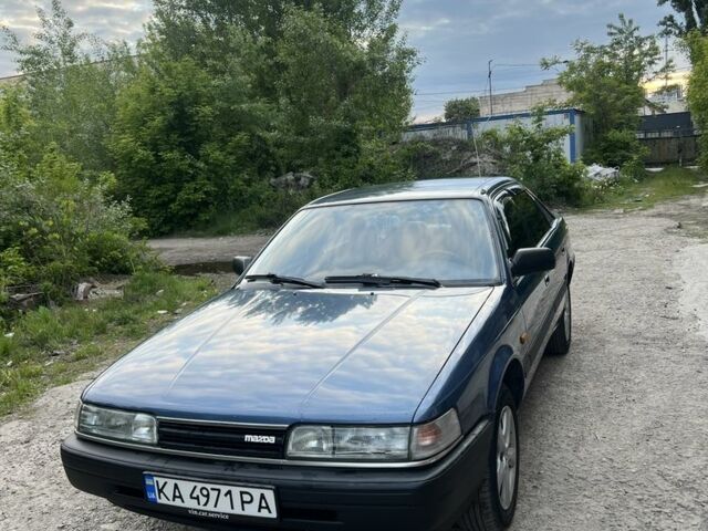 Синій Мазда 626, об'ємом двигуна 2 л та пробігом 179 тис. км за 3200 $, фото 1 на Automoto.ua