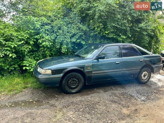 Синій Мазда 626, об'ємом двигуна 2 л та пробігом 500 тис. км за 555 $, фото 1 на Automoto.ua