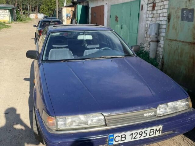 Синій Мазда 626, об'ємом двигуна 2 л та пробігом 137 тис. км за 1000 $, фото 1 на Automoto.ua
