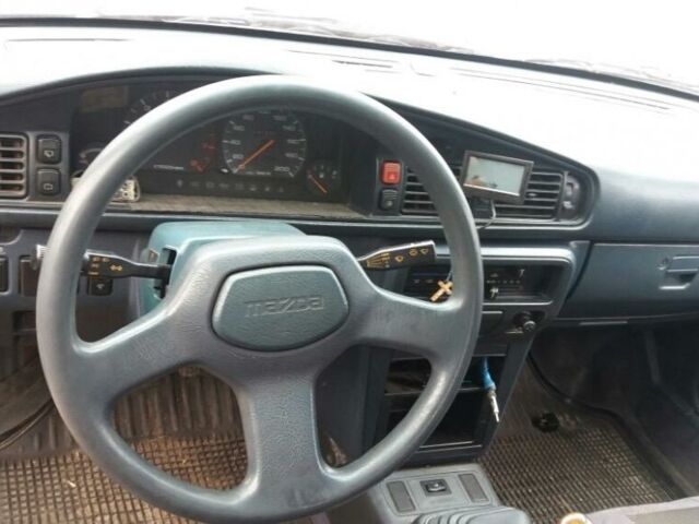 Синий Мазда 626, объемом двигателя 2 л и пробегом 34 тыс. км за 1600 $, фото 1 на Automoto.ua