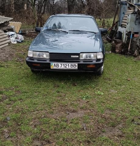 Синий Мазда 626, объемом двигателя 2 л и пробегом 205 тыс. км за 600 $, фото 1 на Automoto.ua