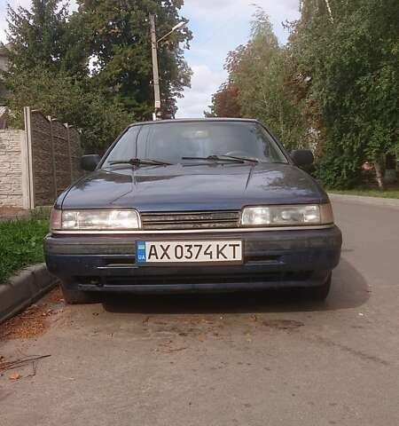 Синий Мазда 626, объемом двигателя 1.99 л и пробегом 564 тыс. км за 1000 $, фото 1 на Automoto.ua