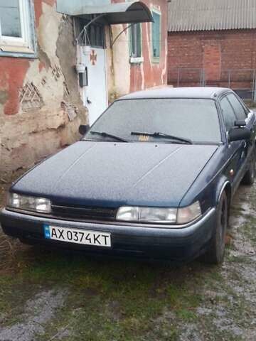 Синий Мазда 626, объемом двигателя 2 л и пробегом 60 тыс. км за 1100 $, фото 1 на Automoto.ua