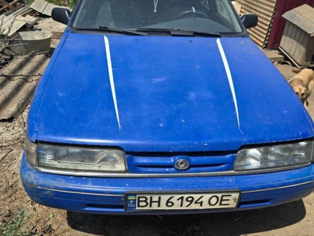 Синій Мазда 626, об'ємом двигуна 2.2 л та пробігом 450 тис. км за 1200 $, фото 1 на Automoto.ua
